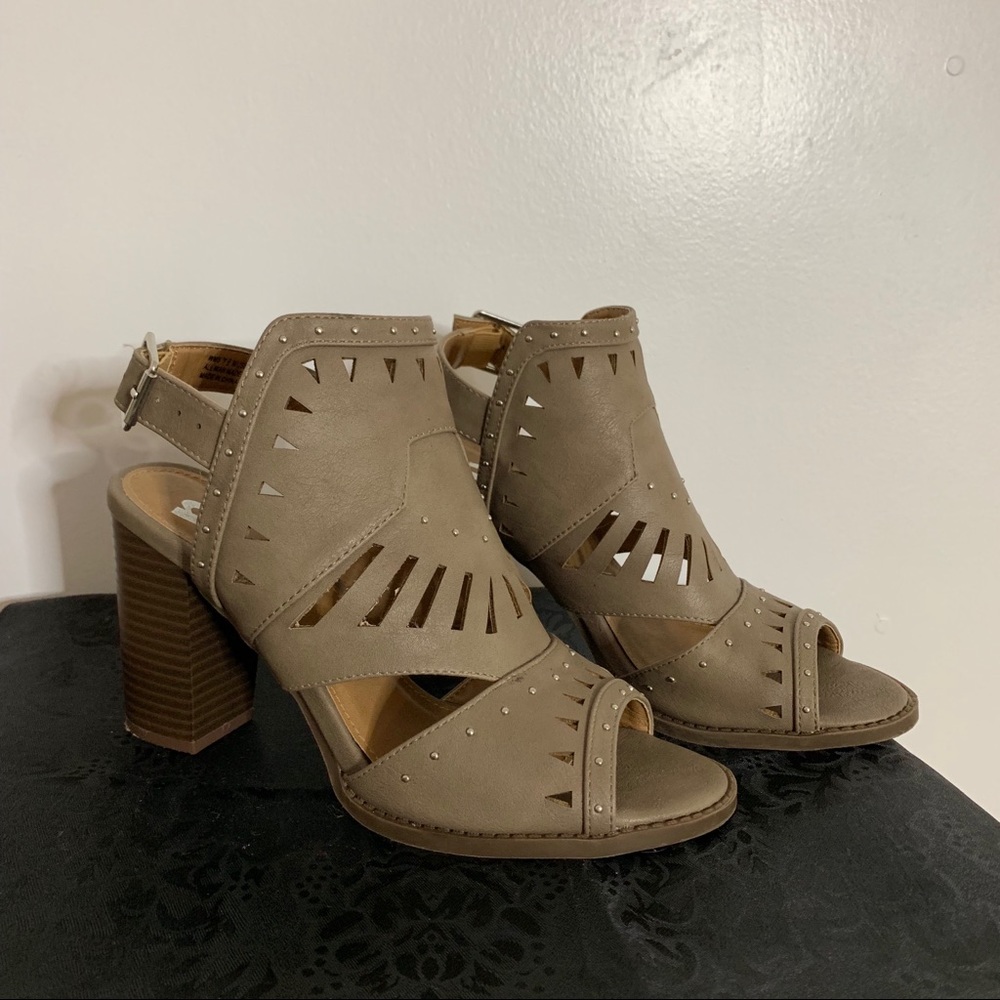 Studded grey heels.